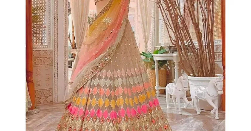 Multi Colored Butterfly Net Mirror Work Lehenga Choli on clothsvilla.com